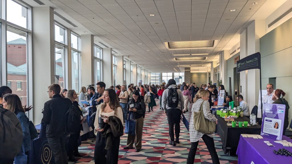 Photo of attendees checking out the Massachusetts Nonprofit Network exhibition hall.