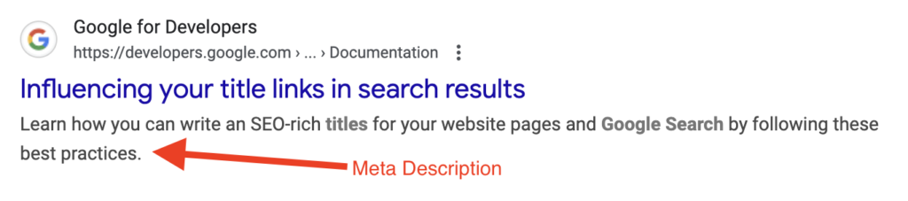 red arrow pointing to a seo meta description screenshot example. 