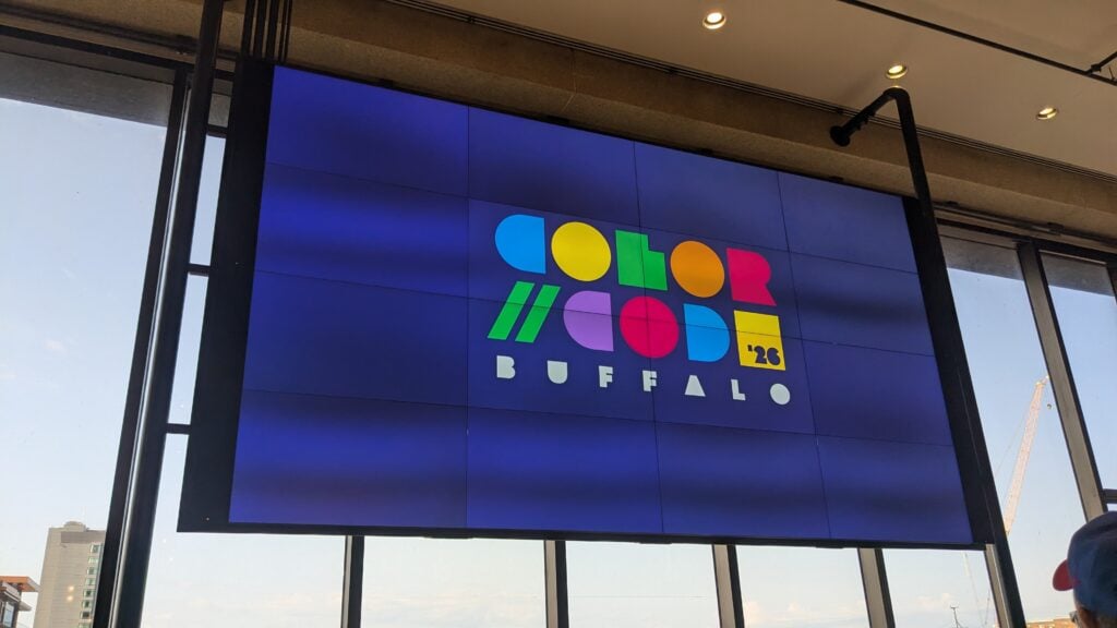 ColorCode: Buffalo event logo being projected on a large LCD monitor