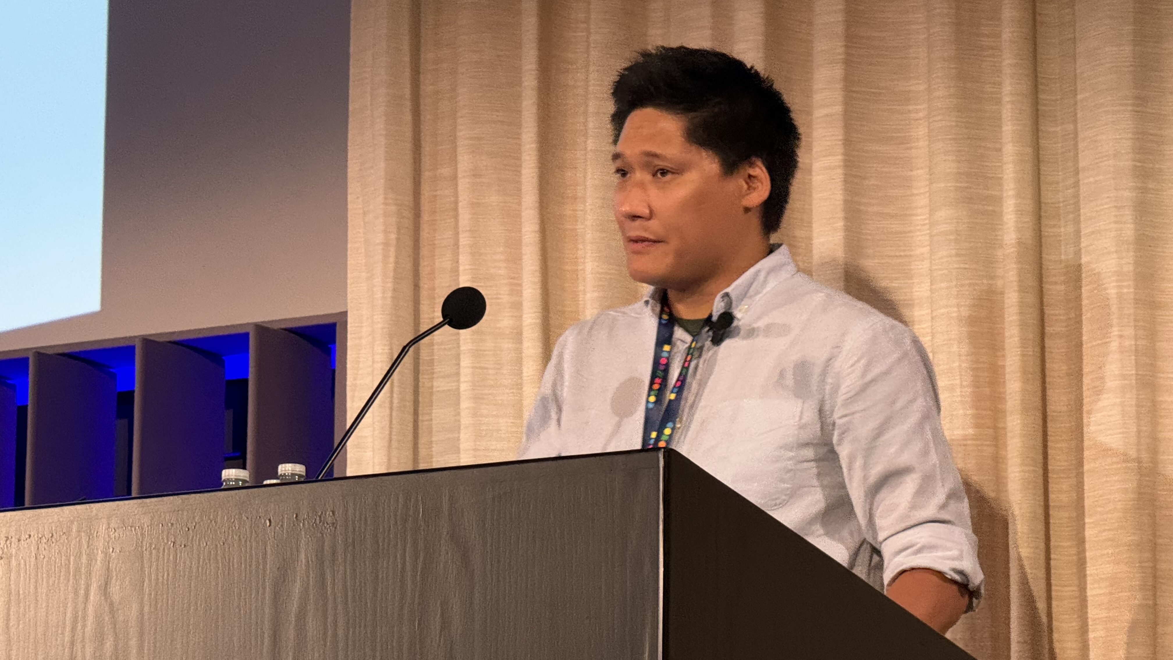 James Lau from Small Actions Studios giving a talk in the Flex track auditorium.